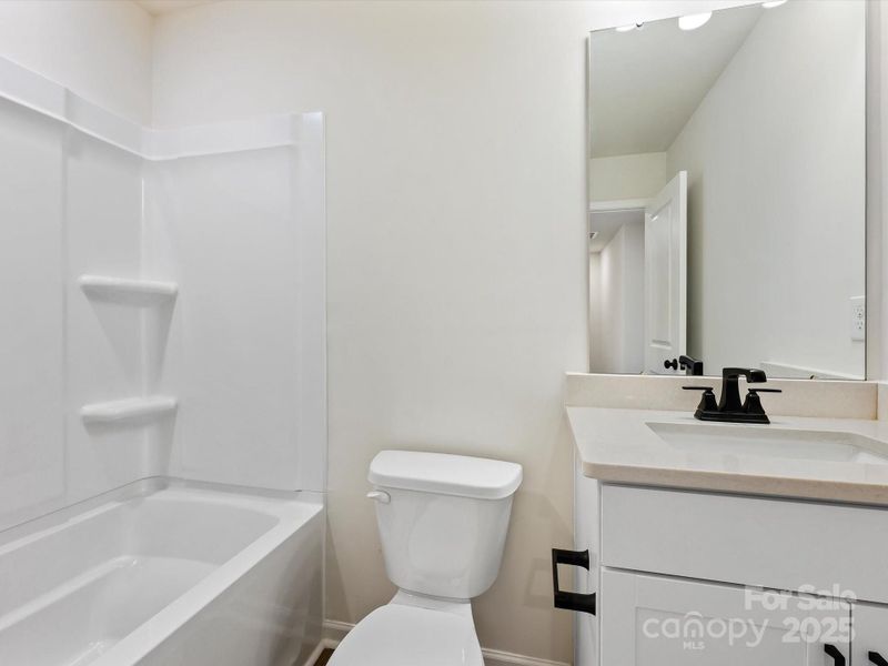 Furnished interior view inside a new home in North Creek Village - Townhomes, Huntersville (Image 9).