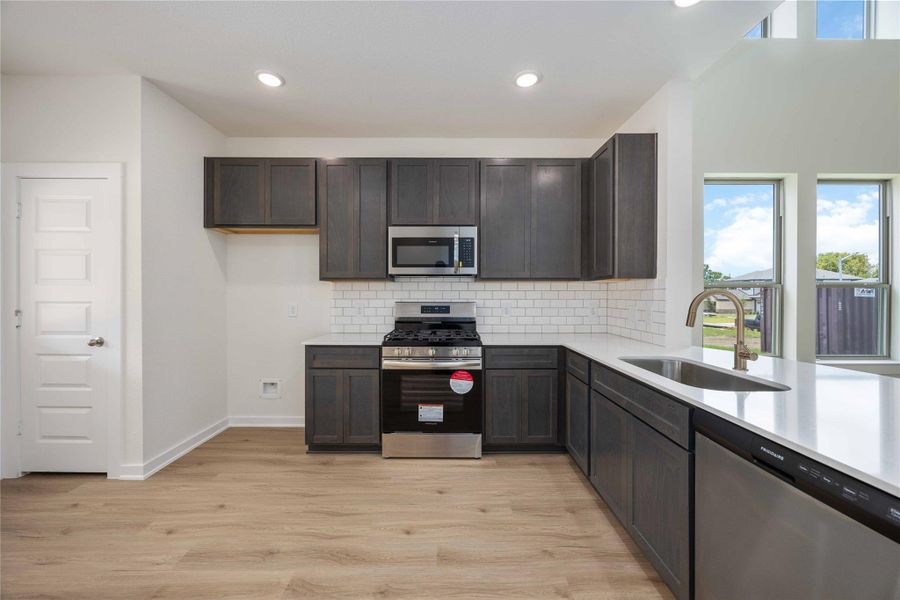 Furnished interior view inside a new home in Lexington Heights, Willis (Image 4).