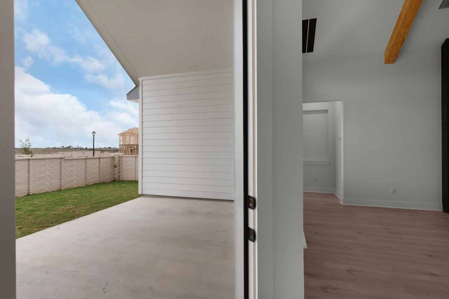 Exterior details and patio area of a home in The Grove at Blackhawk, Pflugerville (Image 30).