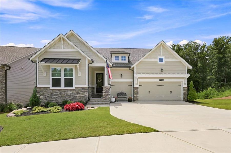 Front exterior of a new home in , Flowery Branch, GA, highlighting curb appeal (Image 22). Front exterior of a new home in , Flowery Branch, GA, highlighting curb appeal (Image 22).