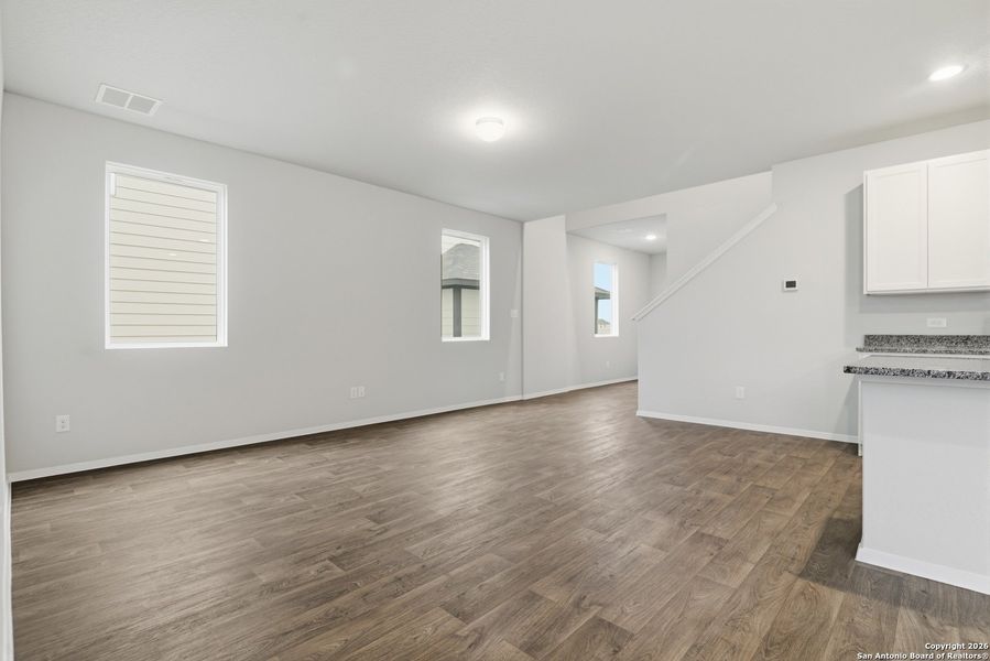 Spacious, unfurnished interior of a new home in Hunters Ranch, San Antonio (Image 42).