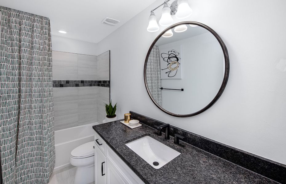 Furnished interior view inside a new home in The Strand at Cedar Grove, North Port (Image 13).