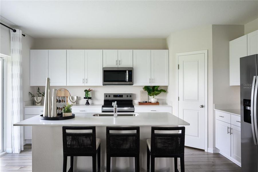 Furnished interior in a model home at Crosswinds in Haines City (Image 12).