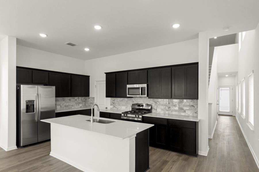 Furnished interior view inside a new home in Trace, San Marcos (Image 13).