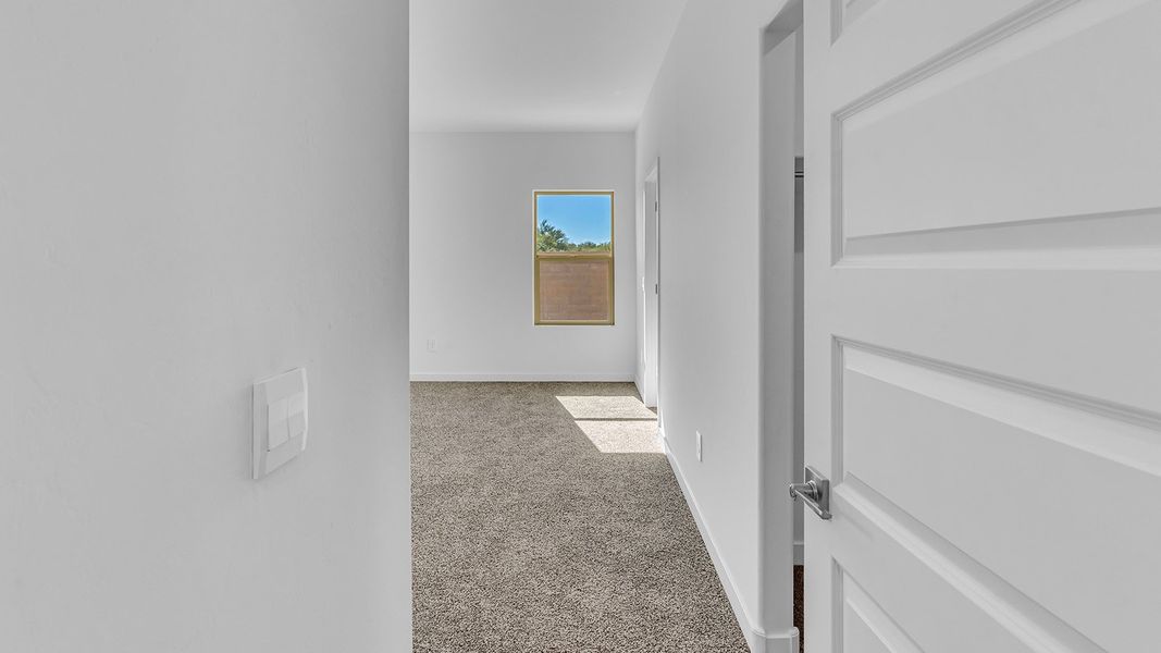 Representative unfurnished interior of a home built from the Parker by D.R. Horton in The Oasis at Rocking K, Vail (Image 38).