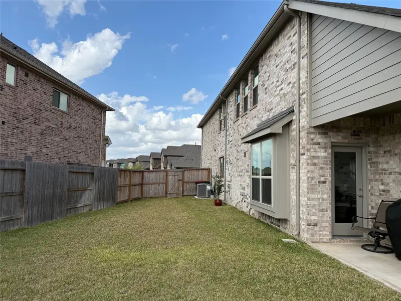 Exterior details and patio area of a home in , Katy (Image 4).