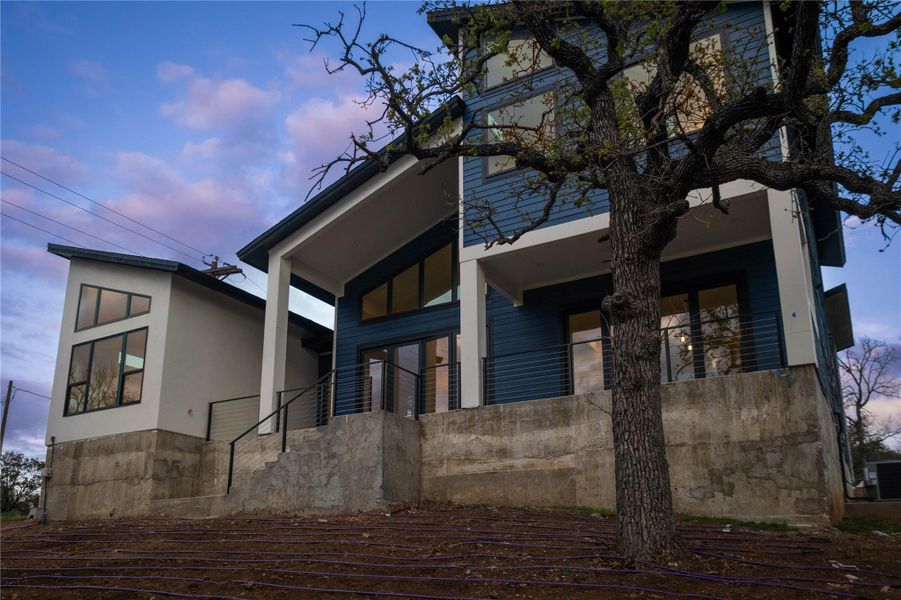 View of property exterior with a balcony