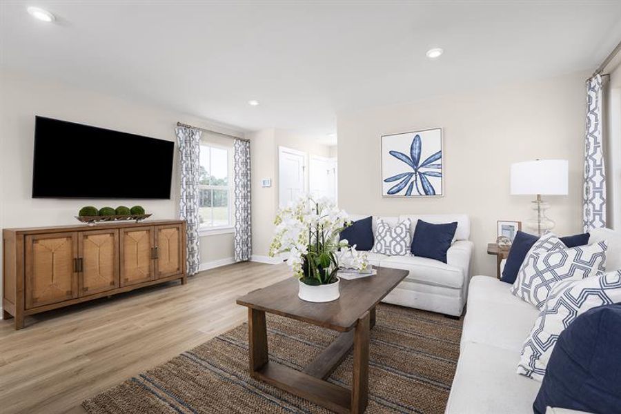 Representative furnished interior of a home built from the Henry by Ryan Homes in Middle Creek Village, Bolivia (Image 3).