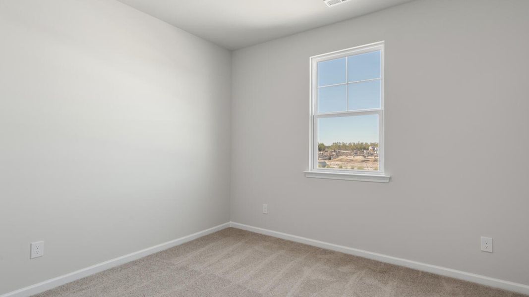 Representative unfurnished interior of a home built from the PERRY by D.R. Horton in The Cottages at Blake Farm, Wilmington (Image 15).