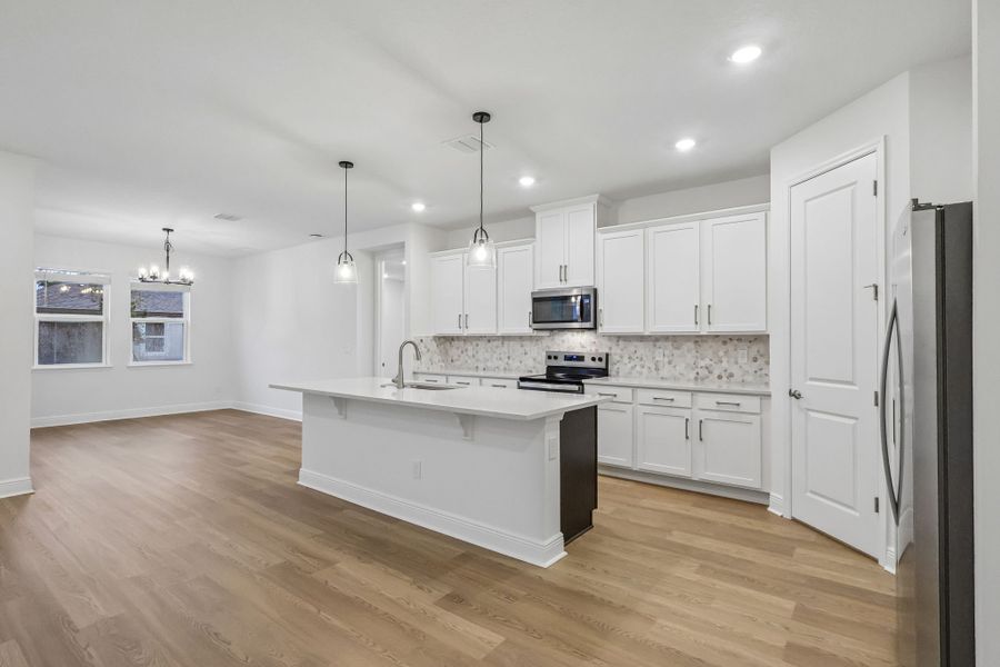 Furnished interior view inside a new home in Legends Preserve - Signature Series, Daytona Beach (Image 3).