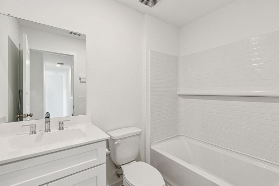 Furnished interior view inside a new home in Mavera, Conroe (Image 11).