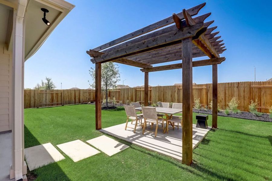 Exterior details and patio area of a home in Village at Three Oaks, Seguin (Image 3). Exterior details and patio area of a home in Village at Three Oaks, Seguin (Image 3).