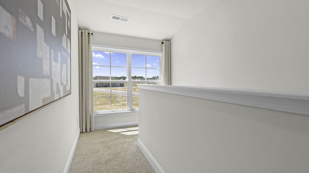 Spacious, unfurnished interior of a new home in The Villas at Kinsley, Jamestown (Image 19).