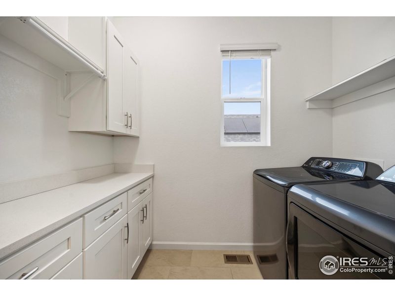laundry room - custom cabinets and work space