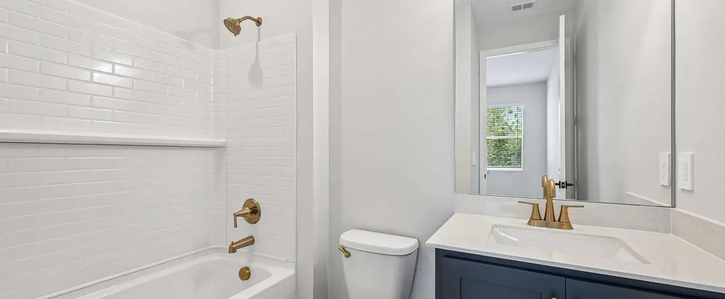 Guest suite attached bathroom this home will feature our AW Collection® Serene - Representative images and renderings are for illustrative purposes Guest suite attached bathroom this home will feature our AW Collection® Serene - Representative images and renderings are for illustrative purposes