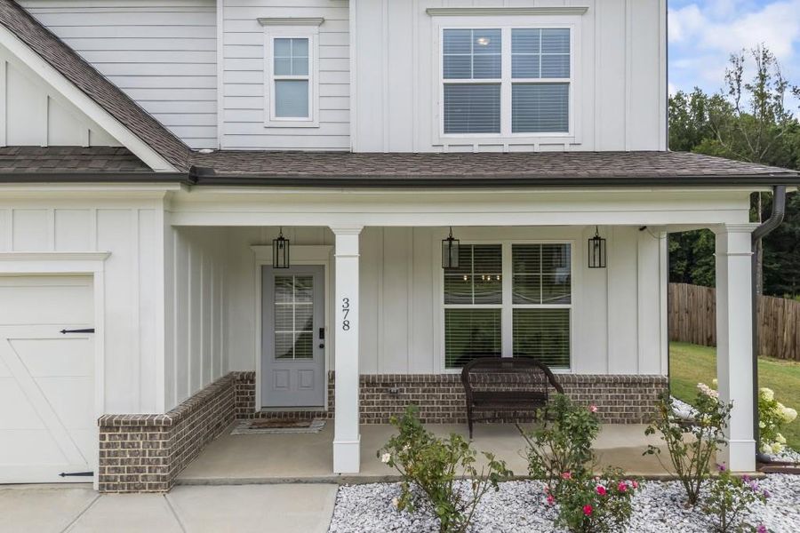 Front exterior of a new home in , Winder, GA, highlighting curb appeal (Image 23).
