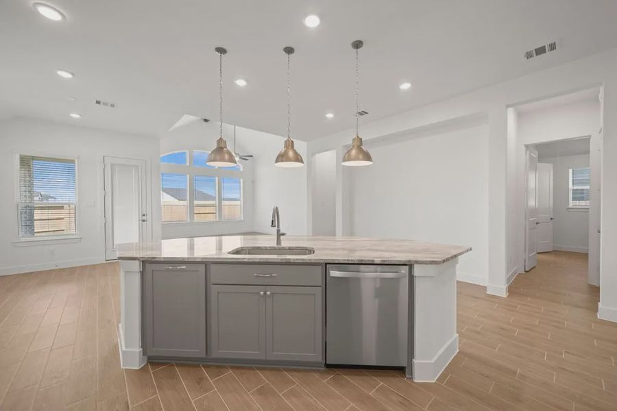 Representative furnished interior of a home built from the Mariah by Chesmar Homes in Lakes of Cane Island, Katy (Image 12).