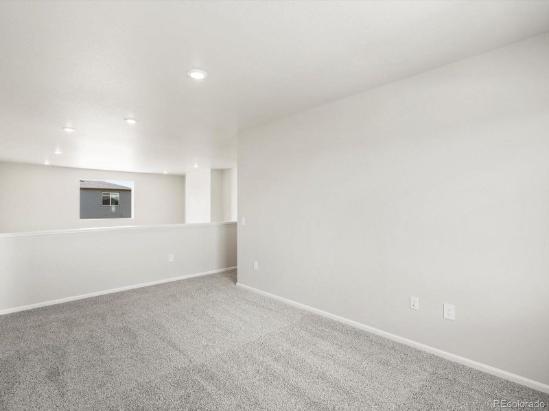 Spacious, unfurnished interior of a new home in Poudre Heights: The Alpine Collection, Windsor (Image 24).