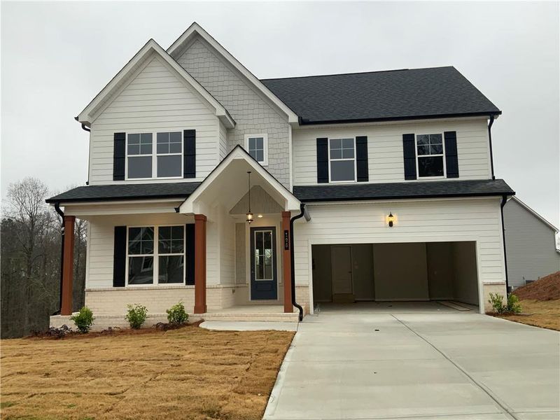 Front exterior of a new home in , Commerce, GA, highlighting curb appeal (Image 1). Front exterior of a new home in , Commerce, GA, highlighting curb appeal (Image 1).