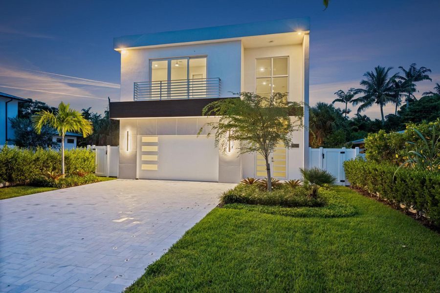 Front exterior of a new home in , Delray Beach, FL, highlighting curb appeal (Image 2). Front exterior of a new home in , Delray Beach, FL, highlighting curb appeal (Image 2).