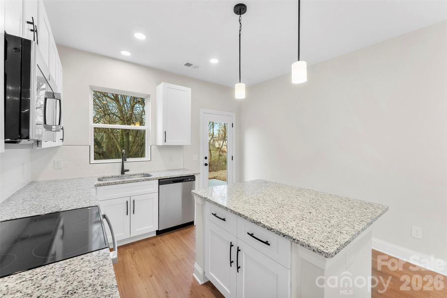 Furnished interior view inside a new home in , Hickory (Image 7).