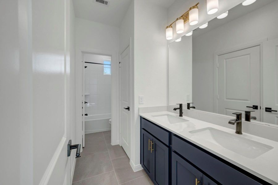 Furnished interior view inside a new home in The Grand Prairie 50’, Hockley (Image 9).