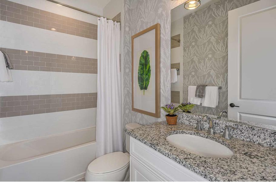 Representative furnished interior of a home built from the Tidewinds 2 by Neal Communities in Grand Park, Sarasota (Image 15).