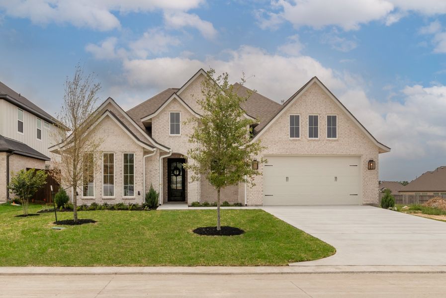 Representative exterior photo of a completed home built from the The Courtney by Reece Homes in Harvest Meadows, Bryan, TX (Image 1). Representative exterior photo of a completed home built from the The Courtney by Reece Homes in Harvest Meadows, Bryan, TX (Image 1).