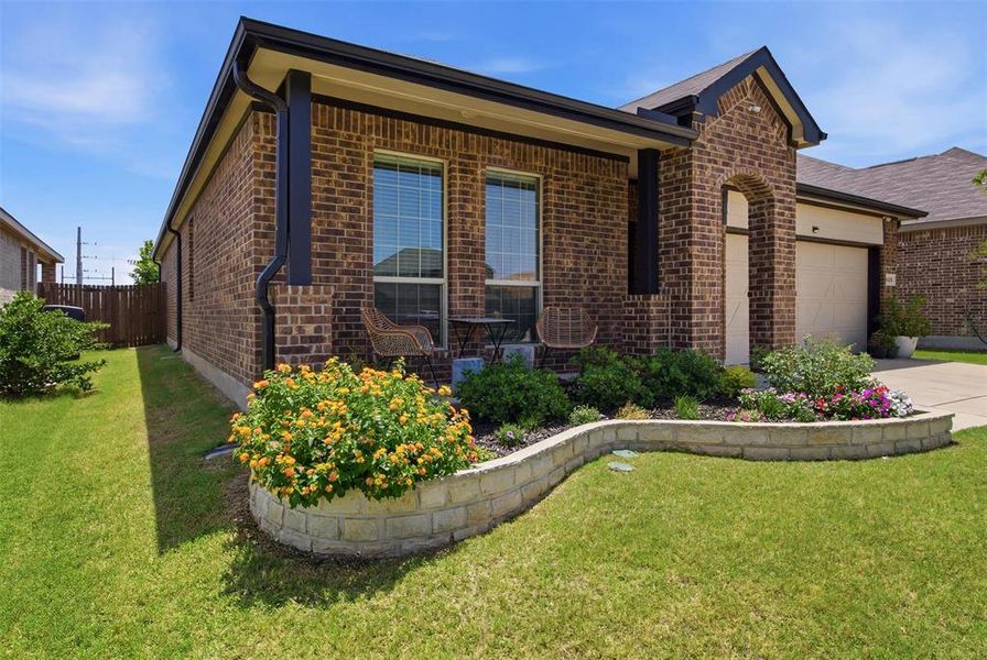 Exterior details and patio area of a home in Kings Ridge, Denton (Image 3). Exterior details and patio area of a home in Kings Ridge, Denton (Image 3).