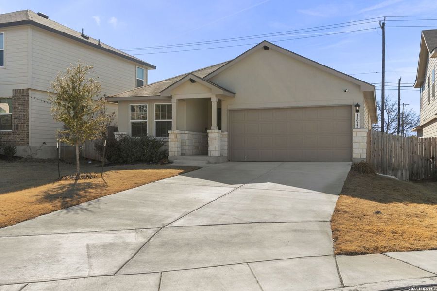 Front exterior of a new home in The Canyons at Amhurst, San Antonio, TX, highlighting curb appeal (Image 23).