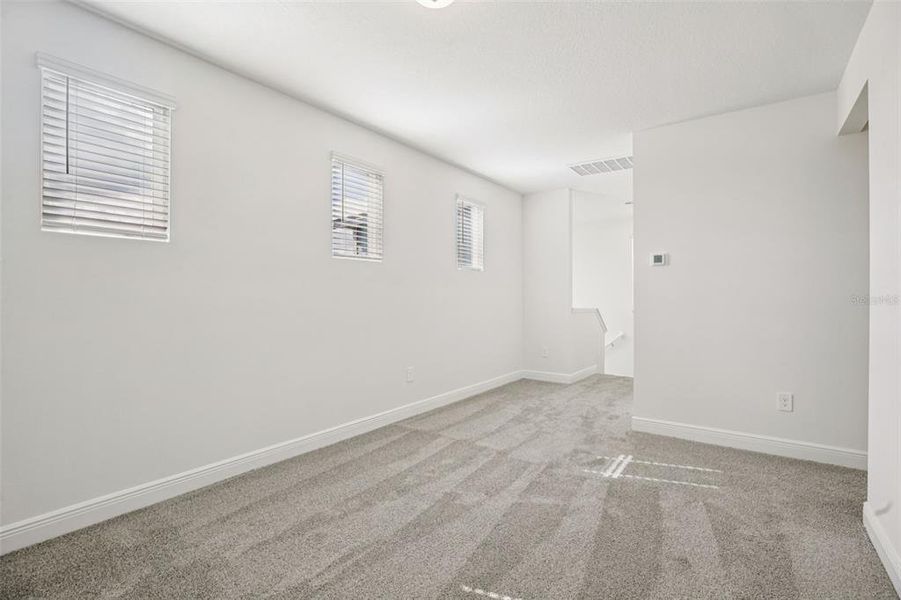 Spacious, unfurnished interior of a new home in Cyrene at Minneola - Villas, Minneola (Image 19).