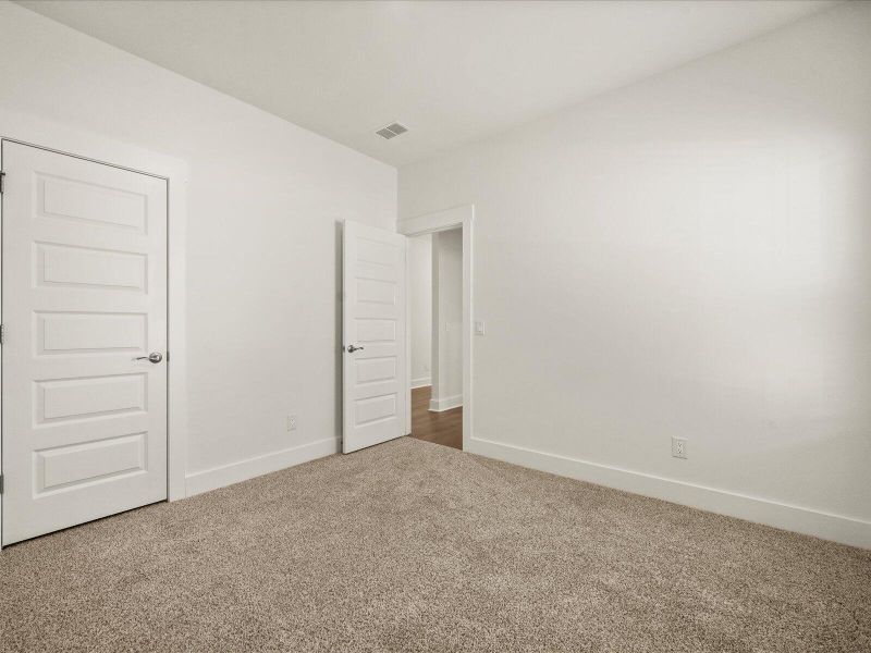 Spacious, unfurnished interior of a new home in The Coves at Lakes of Cane Bay, Summerville (Image 34). Spacious, unfurnished interior of a new home in The Coves at Lakes of Cane Bay, Summerville (Image 34).