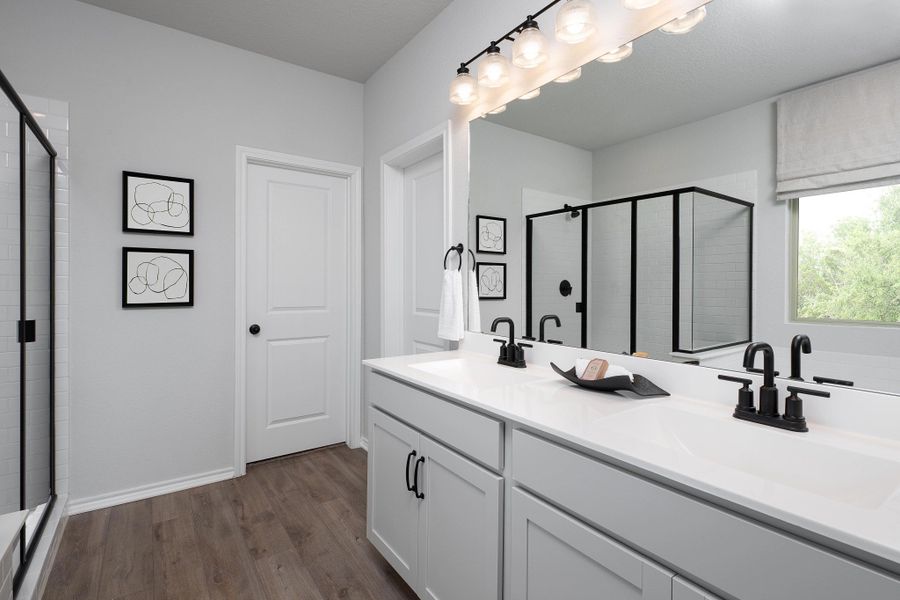 Representative furnished interior of a home built from the Cassidy by Ashton Woods in The Wilder, Adkins (Image 12).