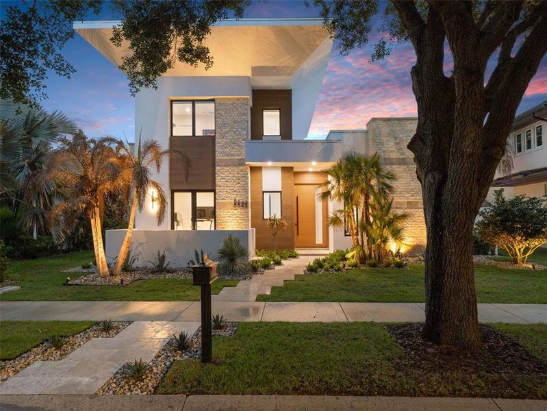 Front exterior of a new home in , Orlando, FL, highlighting curb appeal (Image 28).