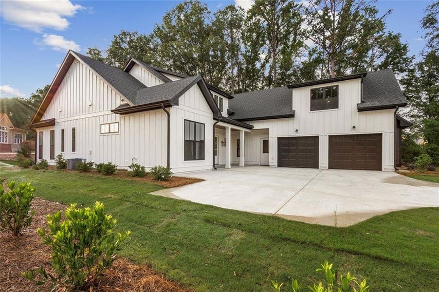 Front exterior of a new home in , Eatonton, GA, highlighting curb appeal (Image 26). Front exterior of a new home in , Eatonton, GA, highlighting curb appeal (Image 26).