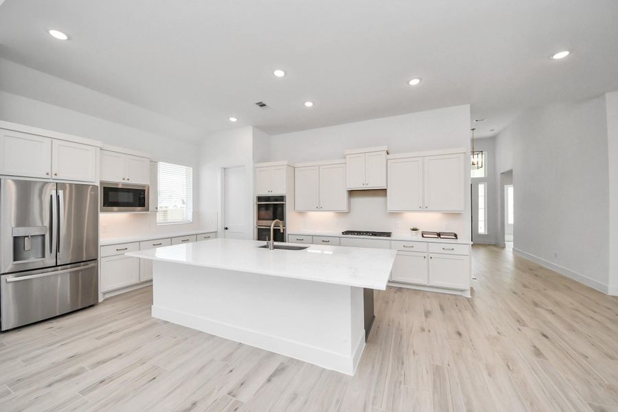 Furnished interior view inside a new home in Meridiana Courtyard Collection, Manvel (Image 7).
