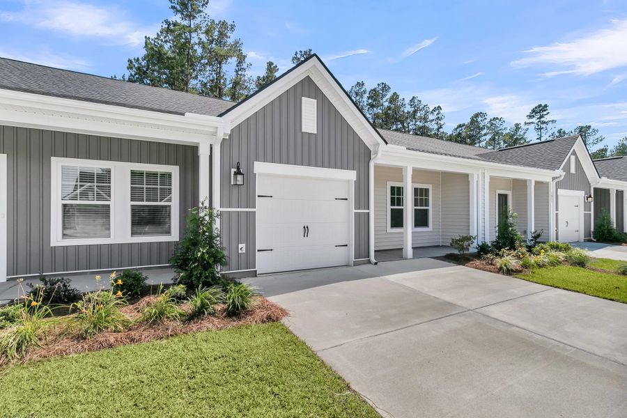 Front exterior of a new home in Hammock Walk at Nexton, Summerville, SC, highlighting curb appeal (Image 2). Front exterior of a new home in Hammock Walk at Nexton, Summerville, SC, highlighting curb appeal (Image 2).