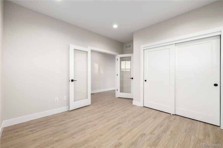 Spacious, unfurnished interior of a new home in West Grange, Longmont (Image 40).