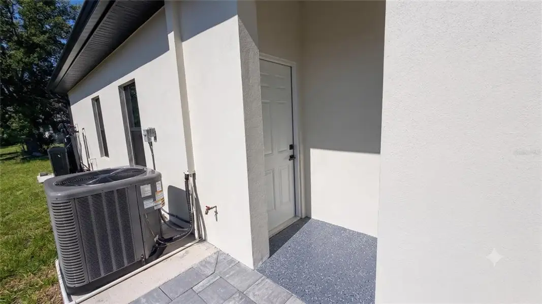 Exterior details and patio area of a home in , North Port (Image 20).