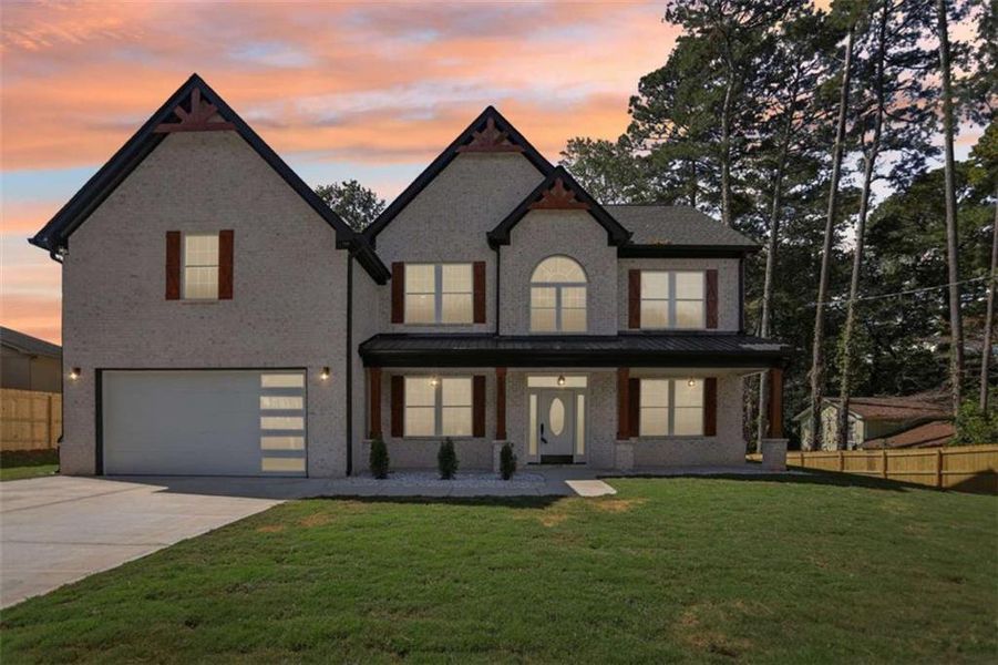 Front exterior of a new home in , Lilburn, GA, highlighting curb appeal (Image 31). Front exterior of a new home in , Lilburn, GA, highlighting curb appeal (Image 31).