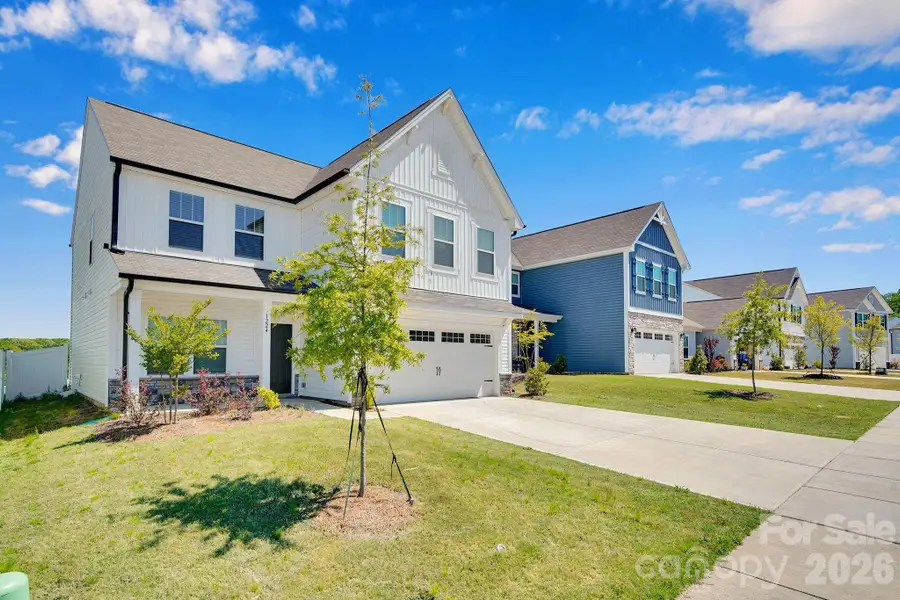 Front exterior of a new home in , Dallas, NC, highlighting curb appeal (Image 2). Front exterior of a new home in , Dallas, NC, highlighting curb appeal (Image 2).