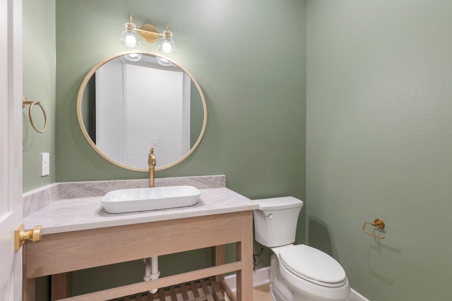 Powder room downstairs for convenience. Powder room downstairs for convenience.