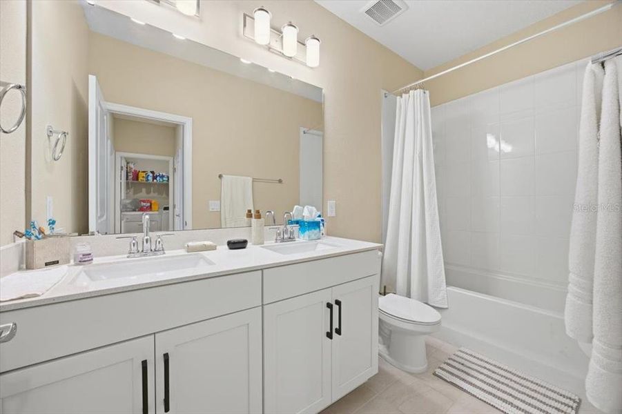 Furnished interior view inside a new home in Highland Ridge, Winter Garden (Image 24).