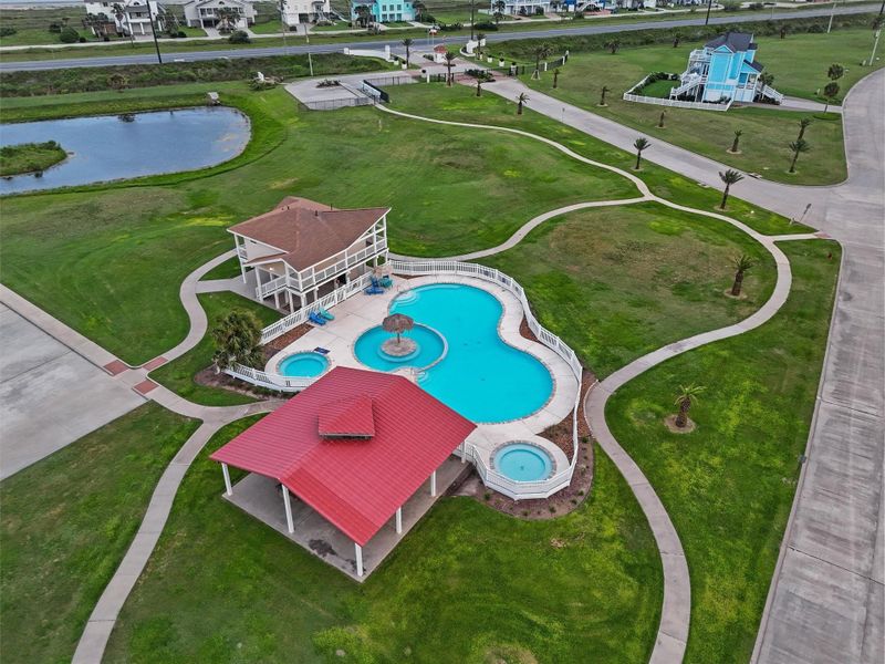 Sunset Cove offers a resort-style community pool with covered gathering space—perfect for relaxing after a day at the beach or bay. Sunset Cove offers a resort-style community pool with covered gathering space—perfect for relaxing after a day at the beach or bay.
