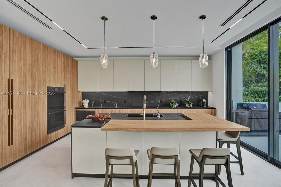 Furnished interior view inside a new home in , Miami Shores (Image 11).