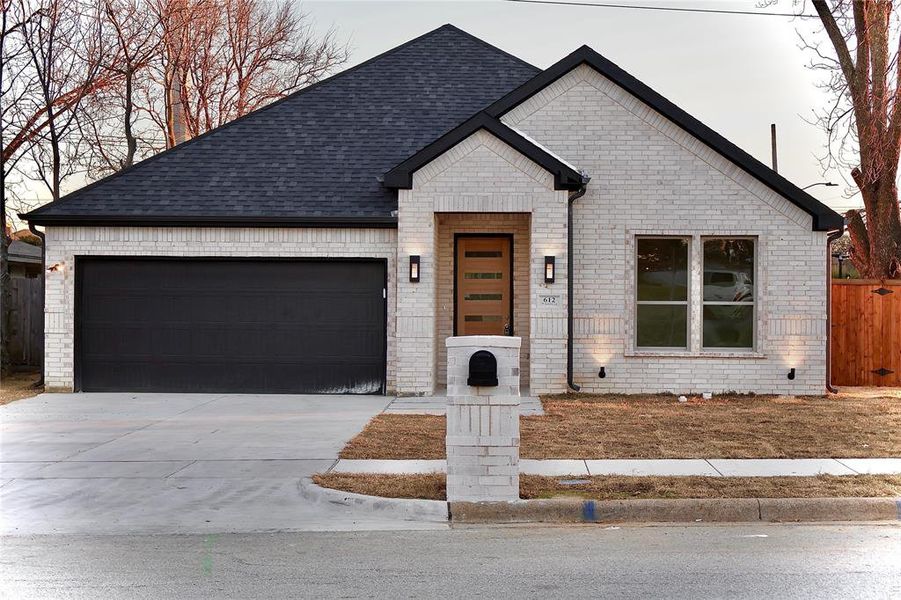 View of front of home featuring a garage