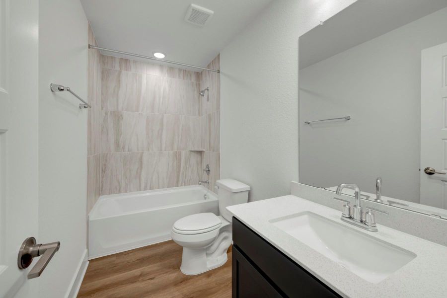 Furnished interior view inside a new home in Marvida, Cypress (Image 12).