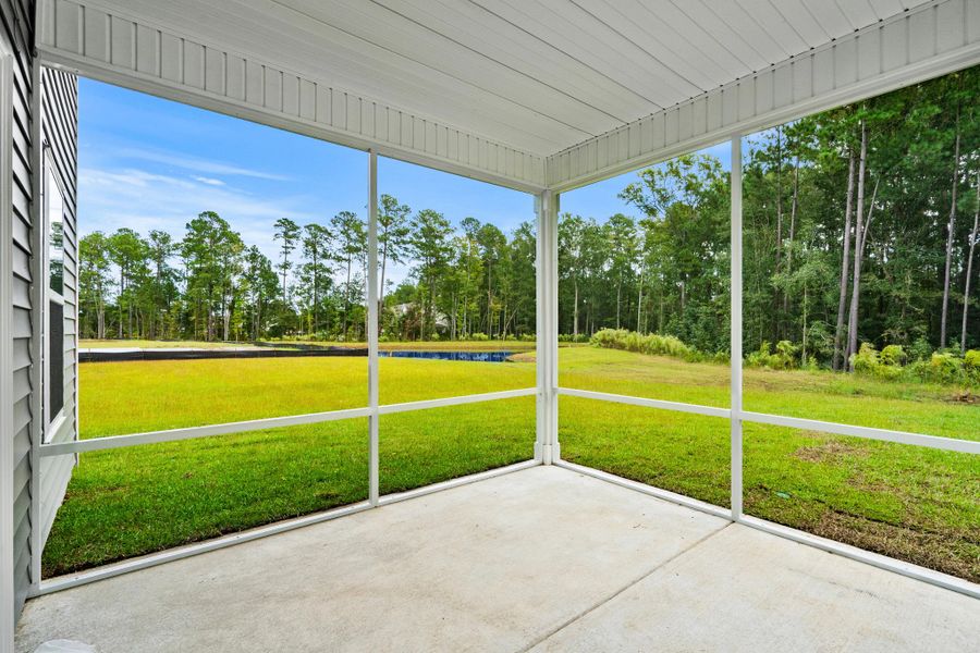 Screened Patio with Pond View Screened Patio with Pond View