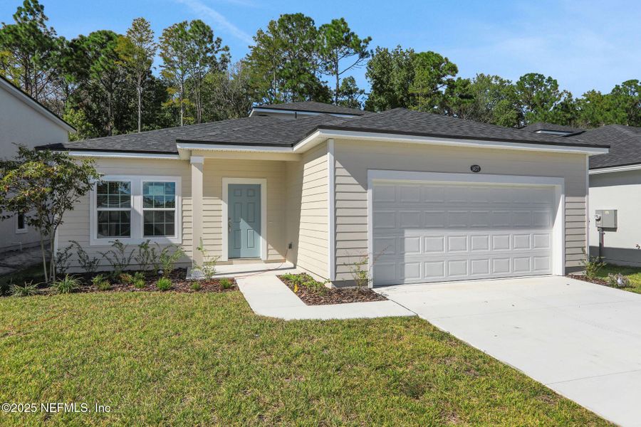Front exterior of a new home in , Jacksonville, FL, highlighting curb appeal (Image 1). Front exterior of a new home in , Jacksonville, FL, highlighting curb appeal (Image 1).