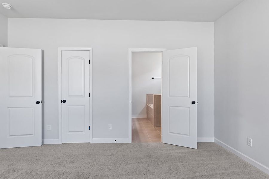 A room with white doors. A room with white doors.